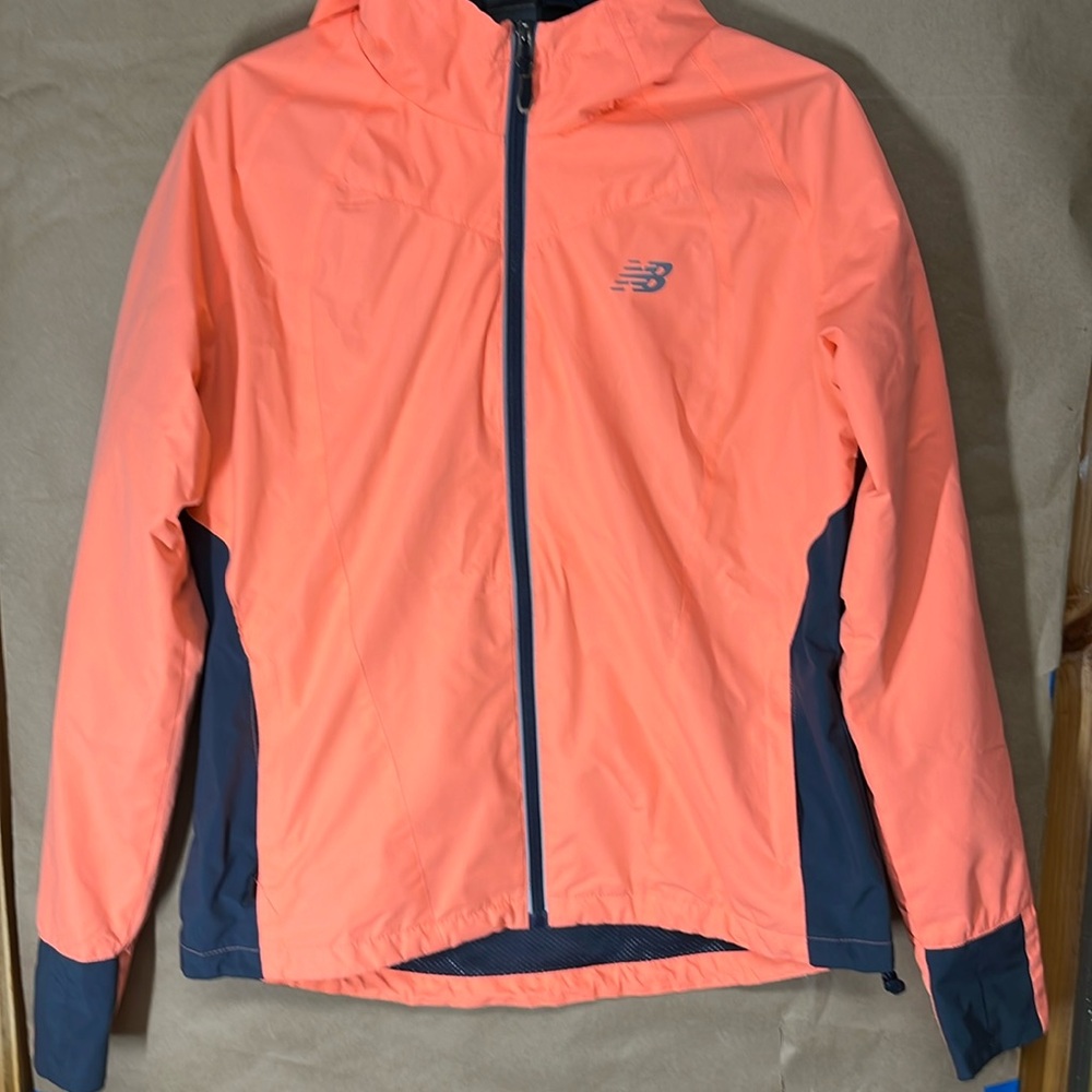 Coral New Balance Women’s size L windbreaker